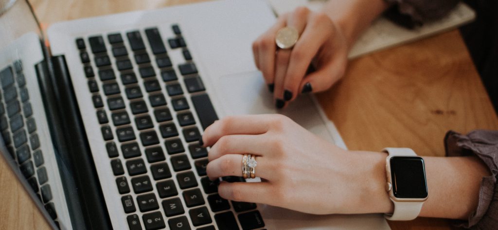 Lady doing research on laptop