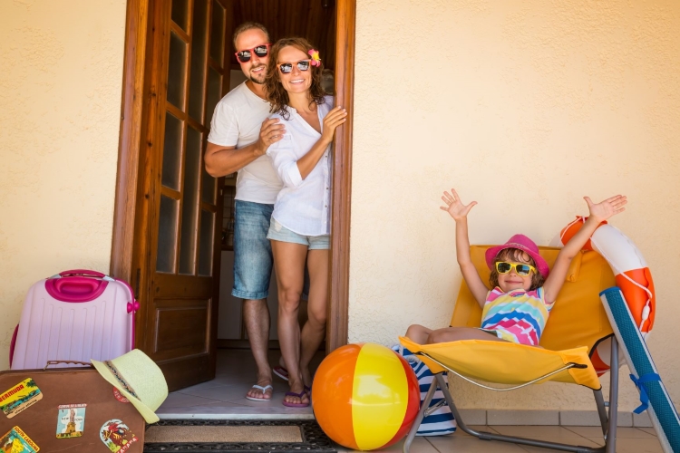 family at a vacation rental smiling